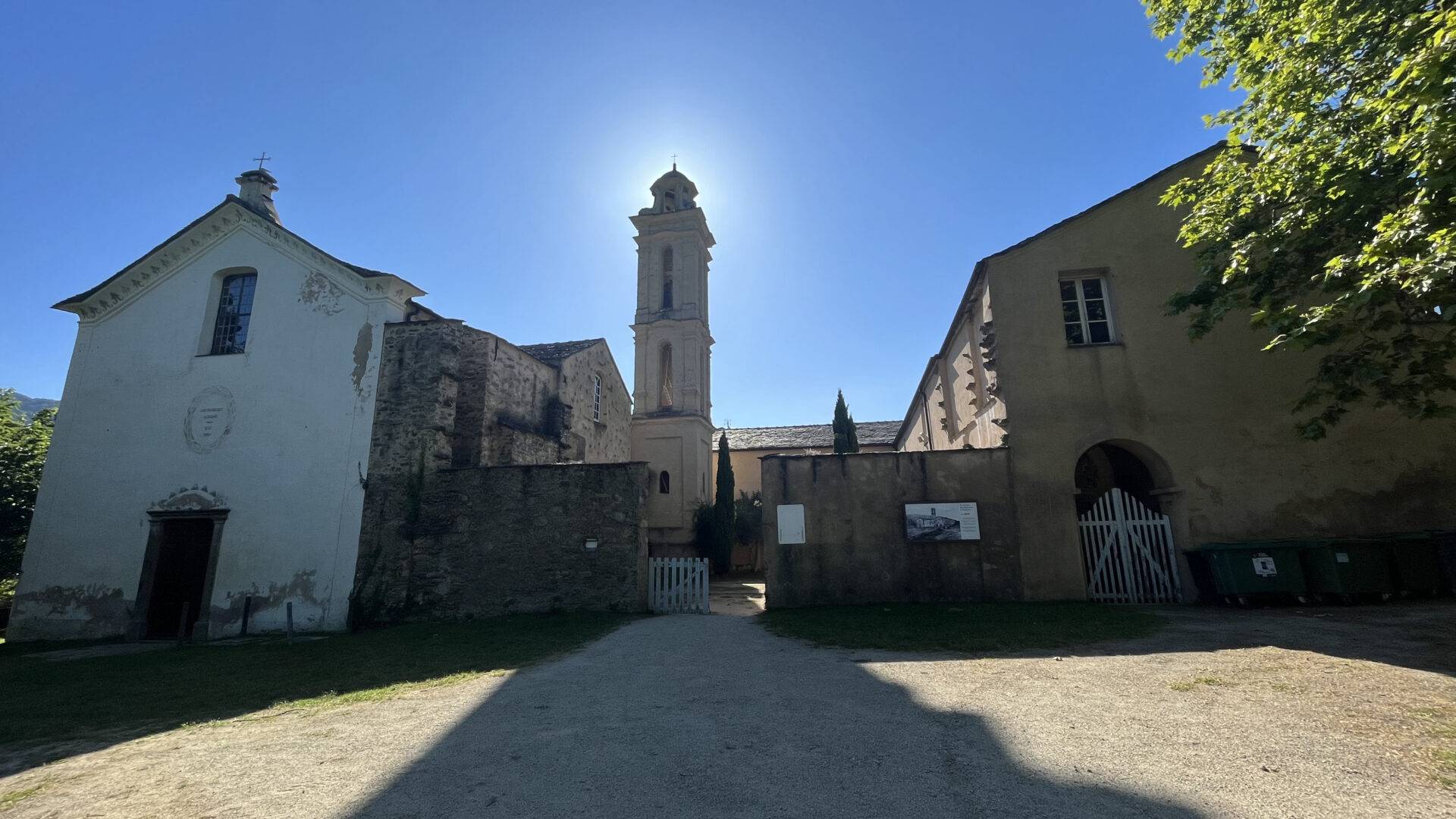 Front view of the church of the convent of alesani in july 2023, and the convent complex.